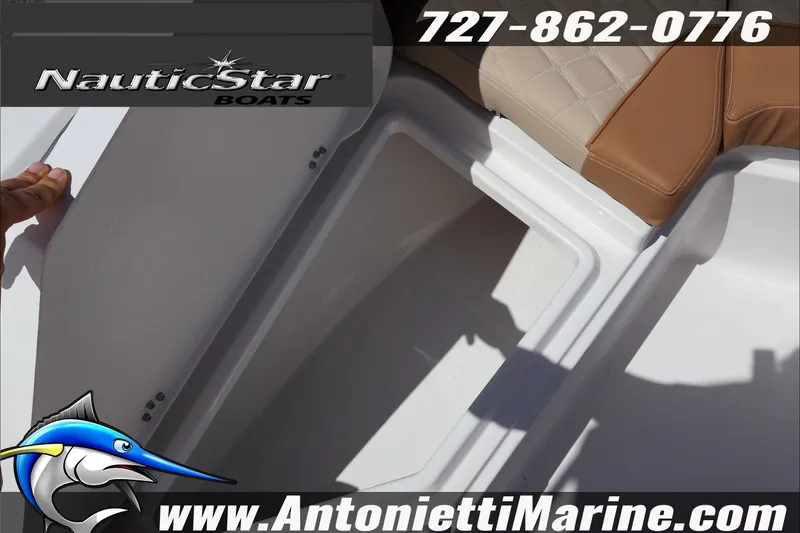 Slide: The Image of 2026 NauticStar 191 Hybrid boat interior with storage compartment and seating. - 16