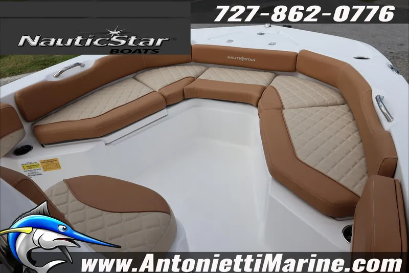 Slide: The Image of 2026 NauticStar 191 Hybrid boat interior with tan seating, showcased by Antonietti Marine. - 17