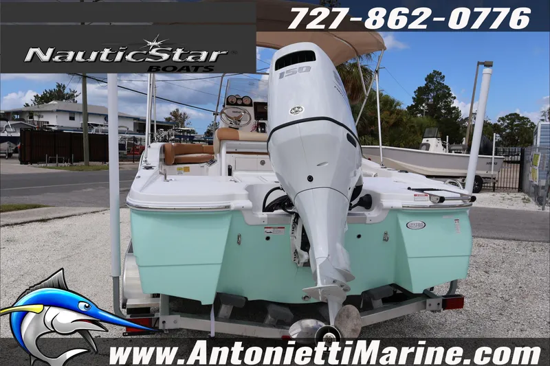 Slide: The Image of 2026 NauticStar 191 Hybrid boat with outboard motor at Antonietti Marine. - 2