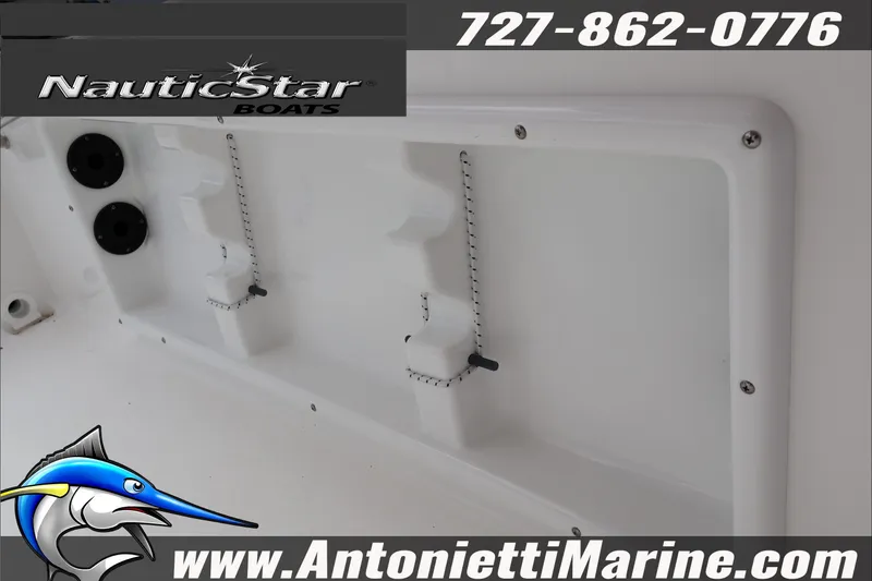 Slide: The Image of 2026 NauticStar 191 Hybrid boat interior detail with contact information and logo. - 20