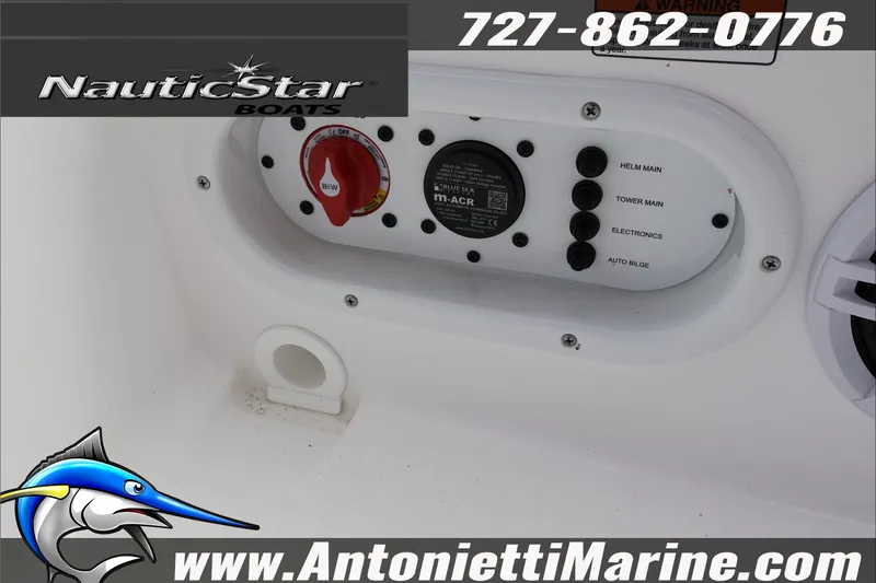 Slide: The Image of Control panel of 2026 NauticStar 191 Hybrid boat with contact details and logo. - 25
