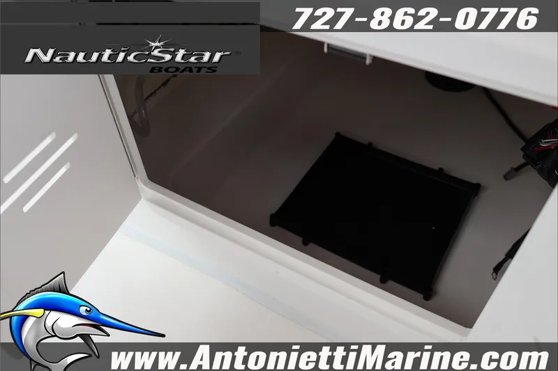 Slide: The Image of Interior view of 2026 NauticStar 191 Hybrid boat storage compartment. - 27