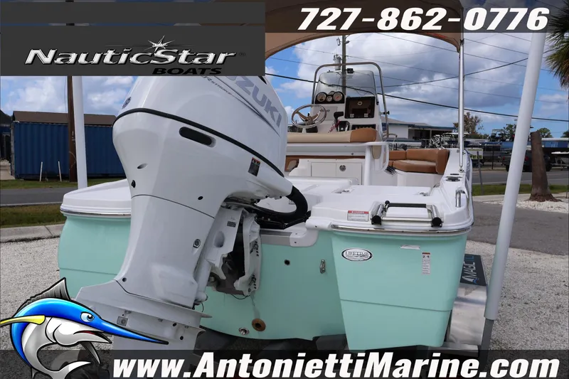 Slide: The Image of 2026 NauticStar 191 Hybrid boat with Suzuki outboard motor, displayed at Antonietti Marine. - 3