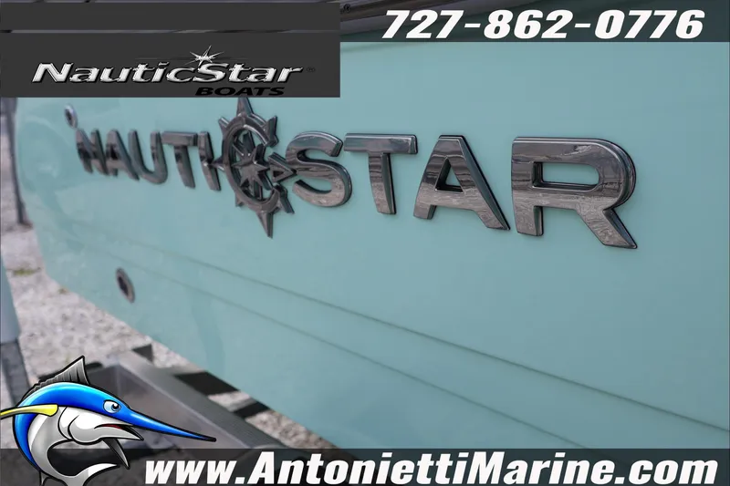Slide: The Image of 2026 NauticStar 191 Hybrid boat logo with contact details and website. - 7