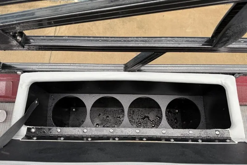 Slide: The Image of 2023 Regency 250 DL3 boat cup holder with water droplets, black and white design. - 25