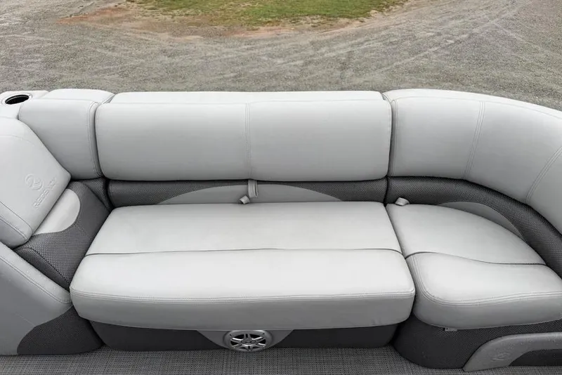 Slide: The Image of 2023 Regency 250 DL3 boat seating with gray upholstery and integrated speaker. - 39