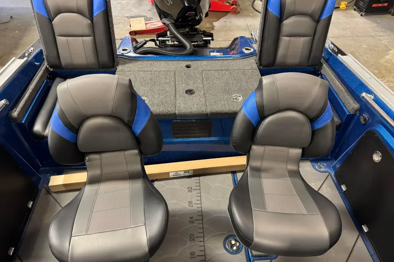 Slide: The Image of Interior of 2026 Nitro ZV20 Sport Pro boat with stylish seating and modern design. - 11