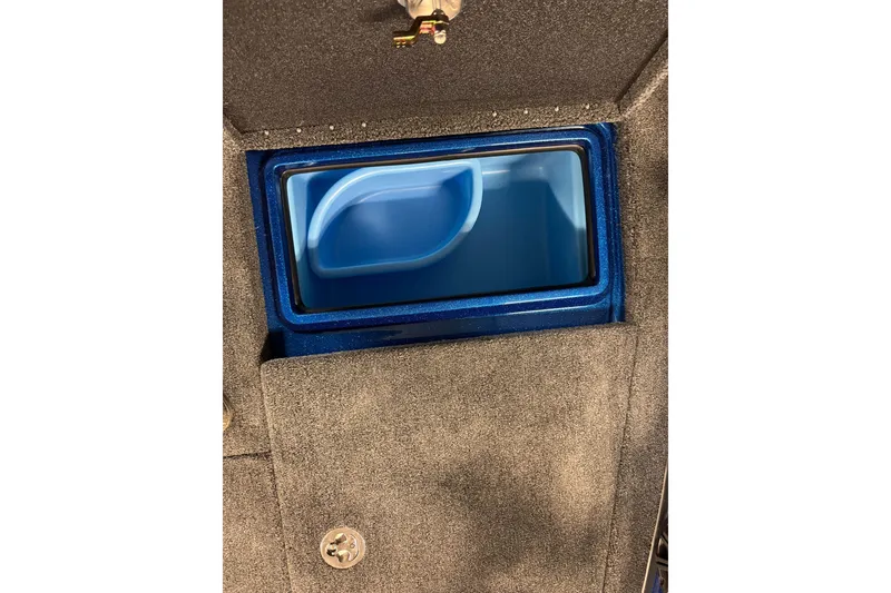 Slide: The Image of Livewell compartment in 2026 Nitro ZV20 Sport Pro boat, featuring blue interior. - 15