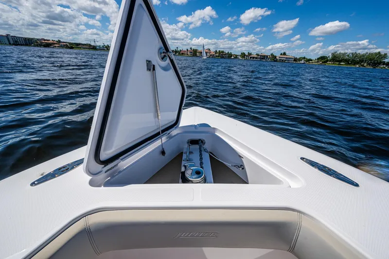 Slide: The Image of Open hatch on 2022 Jupiter 32 boat, overlooking calm waters and blue sky. - 21