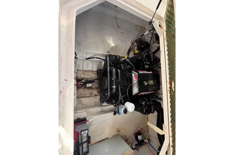 Slide: The Image of Engine compartment of 2000 Sea Ray 240 Sundancer with MerCruiser 5.7L engine. - 8