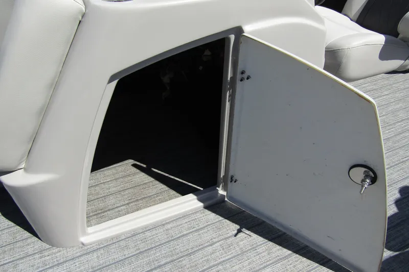 Slide: The Image of Open storage compartment on 2021 Starcraft SLS 1 boat, featuring a sleek design. - 12