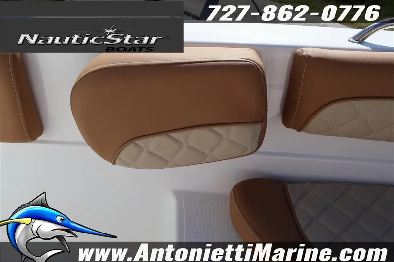 Slide: The Image of 2025 NauticStar 231 Hybrid boat seat detail with contact information and logo. - 27