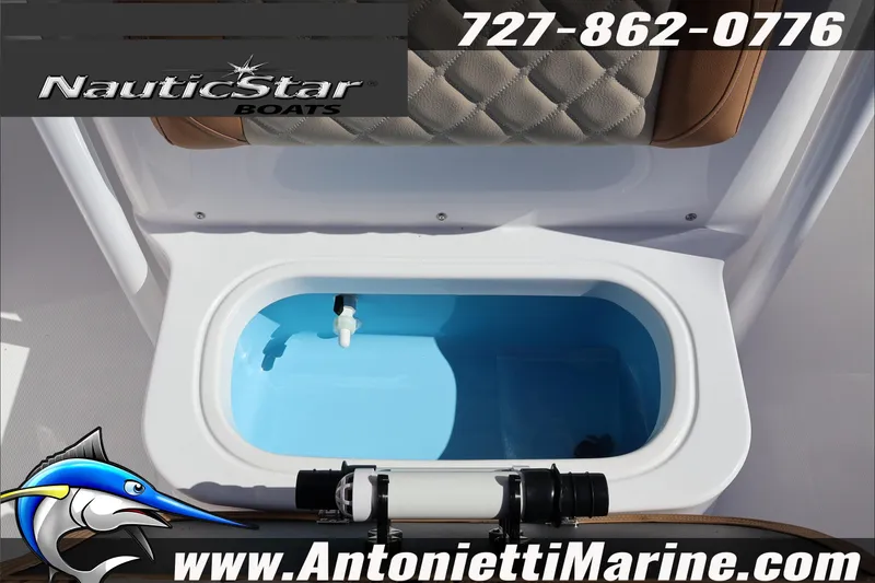 Slide: The Image of 2025 NauticStar 231 Hybrid boat livewell with contact details and logo. - 28