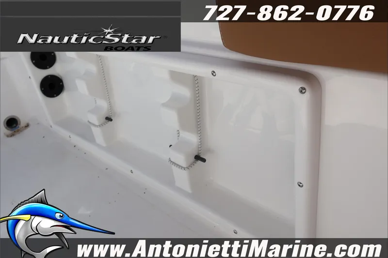 Slide: The Image of 2025 NauticStar 231 Hybrid boat interior with branding and contact details. - 29
