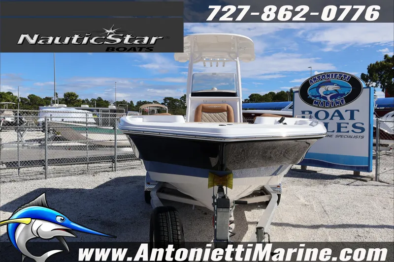 Slide: The Image of 2025 NauticStar 231 Hybrid boat at Antonietti Marine sales lot. - 3