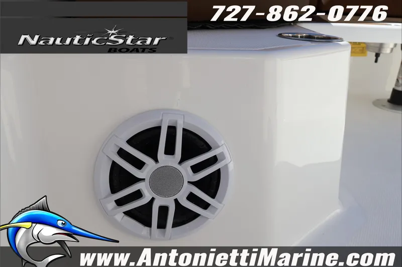 Slide: The Image of NauticStar 231 Hybrid 2025 boat speaker detail with branding and contact information. - 41