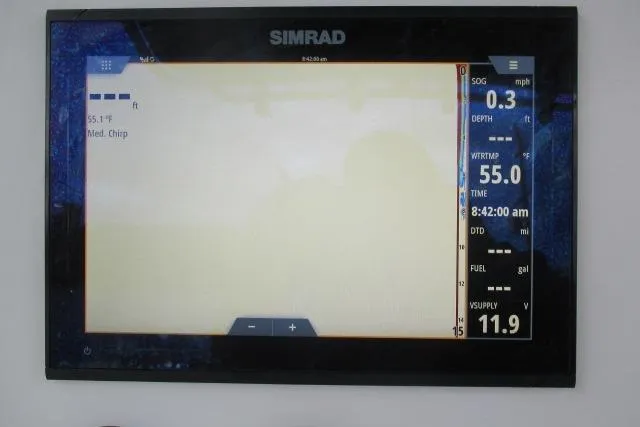 Slide: The Image of Simrad display on 2018 NauticStar 22 XS Offshore showing navigation and system data. - 21