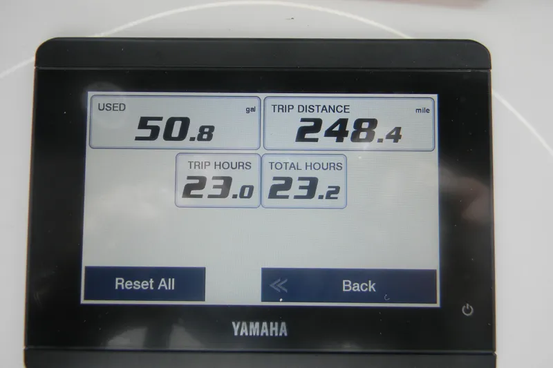 Slide: The Image of Yamaha display showing fuel usage, trip distance, and hours for Parker 2320 SL Sport Cabin 2024. - 2