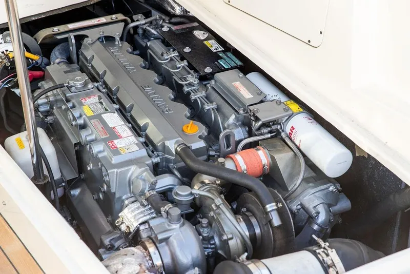 Slide: The Image of Engine compartment of a 2007 Hinckley Talaria 40 boat, showcasing detailed machinery. - 31