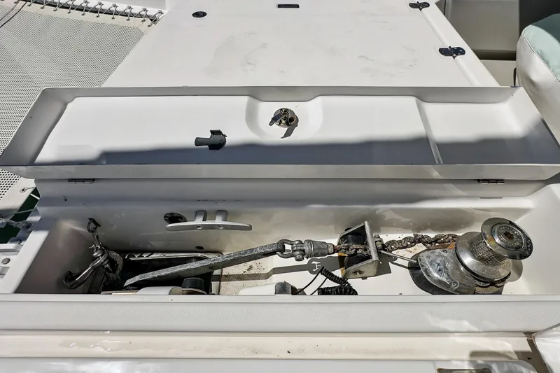 Slide: The Image of Anchor compartment of 2021 Leopard 45 catamaran with winch and chain. - 105