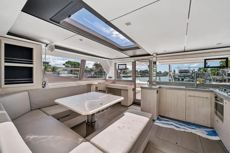 Slide: The Image of Luxurious interior of 2021 Leopard 45 catamaran with modern kitchen and spacious seating area. - 28