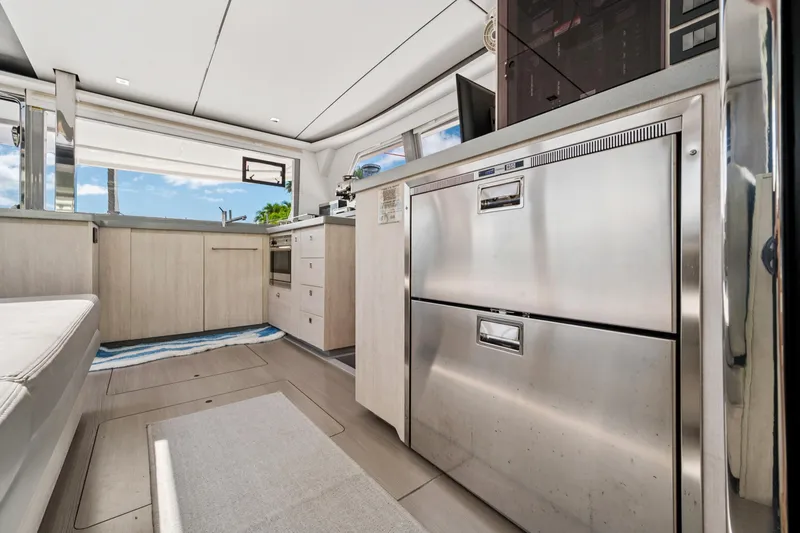Slide: The Image of Modern kitchen interior of 2021 Leopard 45 yacht with stainless steel appliances. - 31