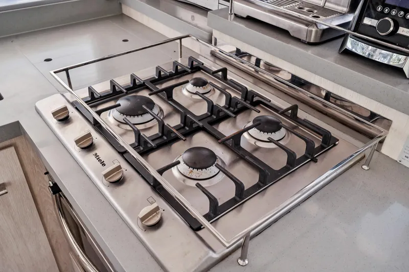 Slide: The Image of Modern kitchen with Miele gas stove on Leopard 45, 2021 model yacht. - 34