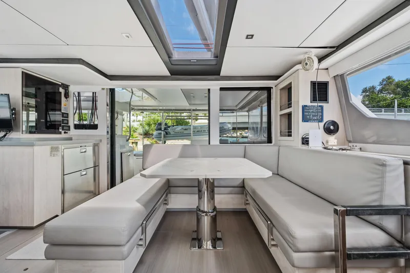 Slide: The Image of Modern interior of 2021 Leopard 45 catamaran with sleek seating and dining area. - 41