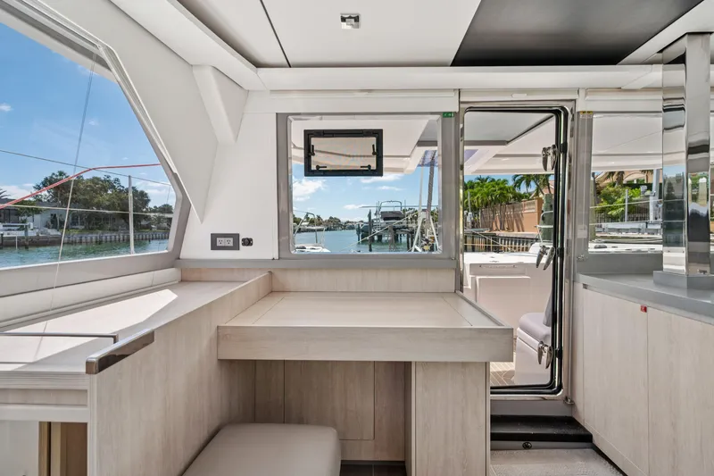 Slide: The Image of Interior of 2021 Leopard 45 yacht with modern design and waterfront view. - 42