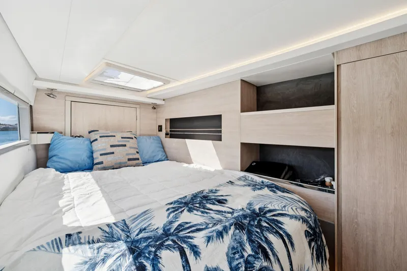 Slide: The Image of Luxurious bedroom interior of 2021 Leopard 45 yacht with modern design and ocean view. - 64