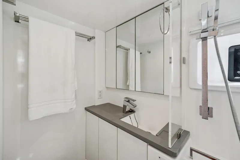 Slide: The Image of Modern bathroom in 2021 Leopard 45 yacht with sleek fixtures and mirrored cabinets. - 67