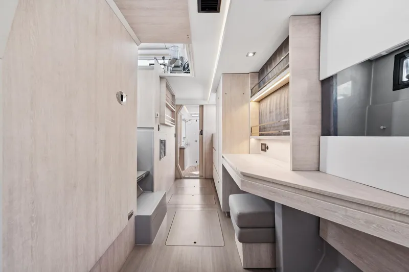 Slide: The Image of Modern interior of 2021 Leopard 45 yacht with sleek wooden finishes and ambient lighting. - 75