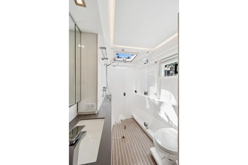 Slide: The Image of Modern bathroom interior on 2021 Leopard 45 yacht, featuring sleek design and natural lighting. - 78