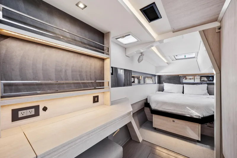 Slide: The Image of Luxurious interior of 2021 Leopard 45 yacht with modern bedroom and workspace. - 80