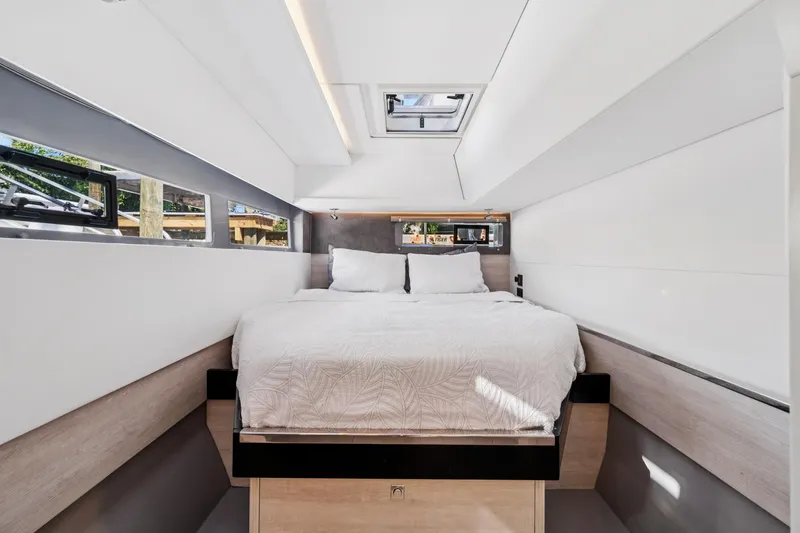 Slide: The Image of Modern bedroom interior on 2021 Leopard 45 yacht, featuring a cozy bed and sleek design. - 81