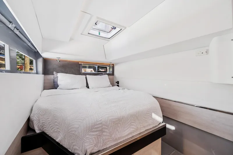 Slide: The Image of Luxurious cabin interior of 2021 Leopard 45 yacht with cozy bed and modern design. - 82