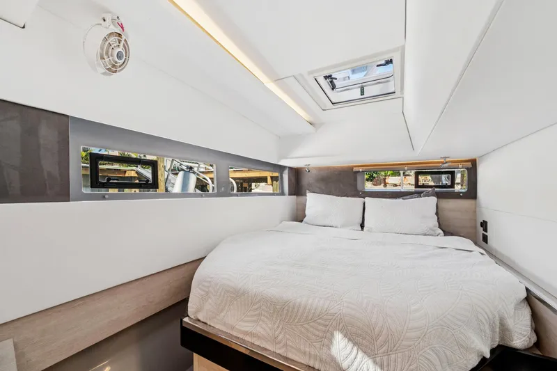 Slide: The Image of Luxurious bedroom interior of 2021 Leopard 45 catamaran with modern design and skylight. - 83