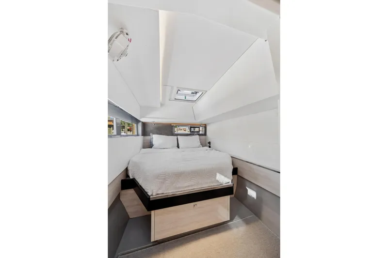 Slide: The Image of Luxurious bedroom interior of 2021 Leopard 45 yacht with modern design and skylight. - 84
