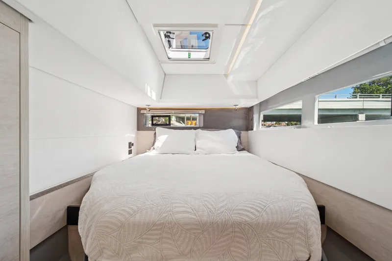 Slide: The Image of Luxurious bedroom interior of 2021 Leopard 45 yacht with skylight and modern design. - 86