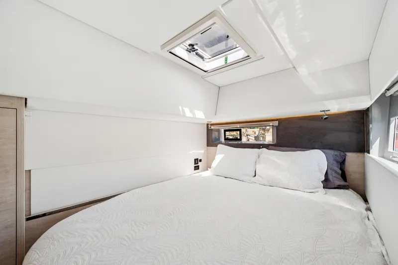 Slide: The Image of Luxurious bedroom interior of 2021 Leopard 45 yacht with skylight and modern design. - 88