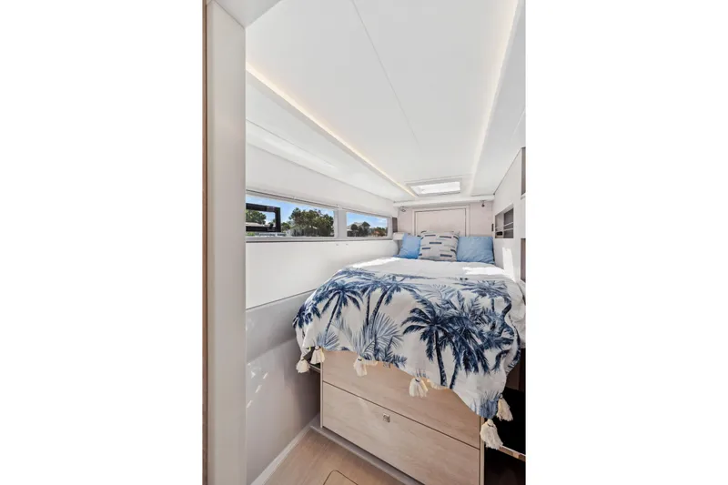 Slide: The Image of Luxurious bedroom interior of 2021 Leopard 45 yacht with tropical-themed bedding. - 93