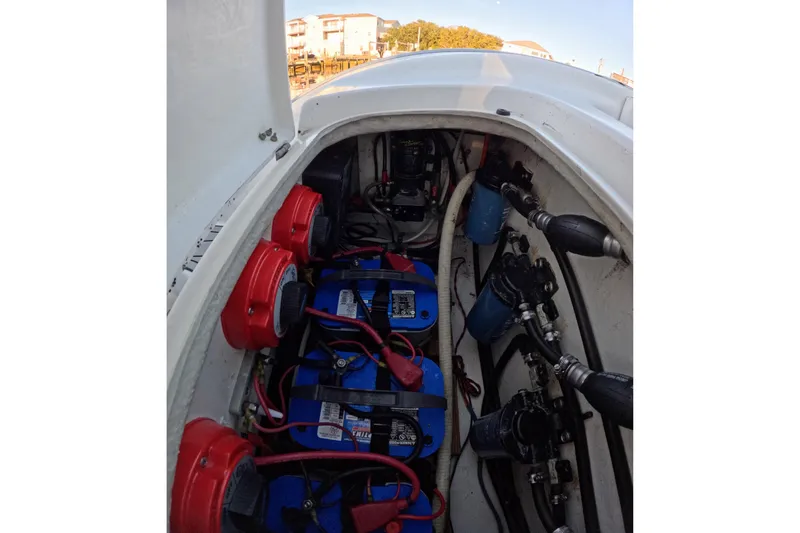 Slide: The Image of Battery compartment of a 2007 Cape Horn 36T boat with wiring and components. - 8