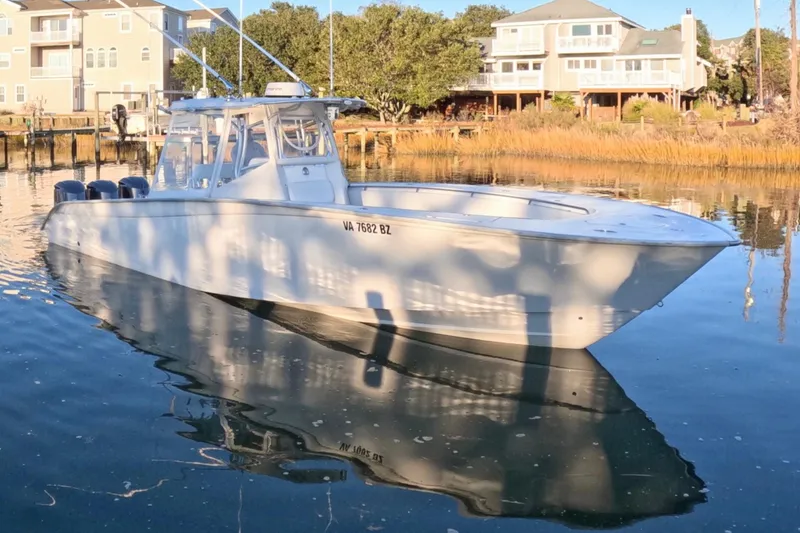 The Image of 2007 Cape Horn 36T boat docked in a serene waterfront setting. - 1
