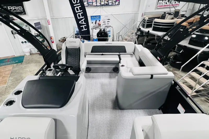 Slide: The Image of 2025 Harris Solstice 250 pontoon boat interior with luxurious seating and modern design. - 11