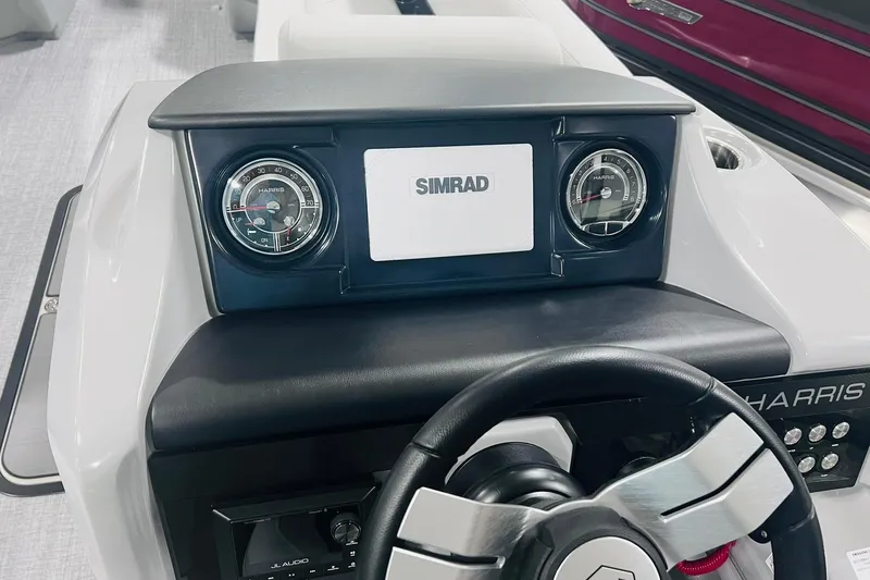 Slide: The Image of 2025 Harris Solstice 250 dashboard with Simrad display and gauges. - 20