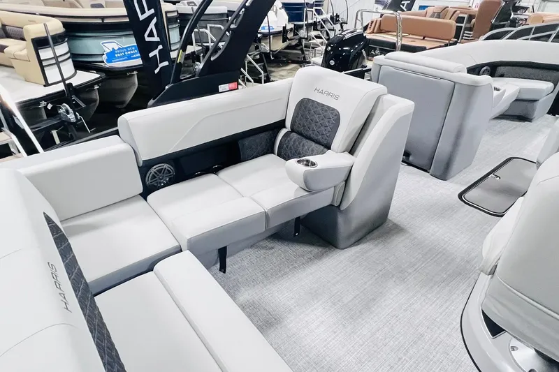 Slide: The Image of 2025 Harris Solstice 250 pontoon boat interior with luxurious seating and modern design. - 26