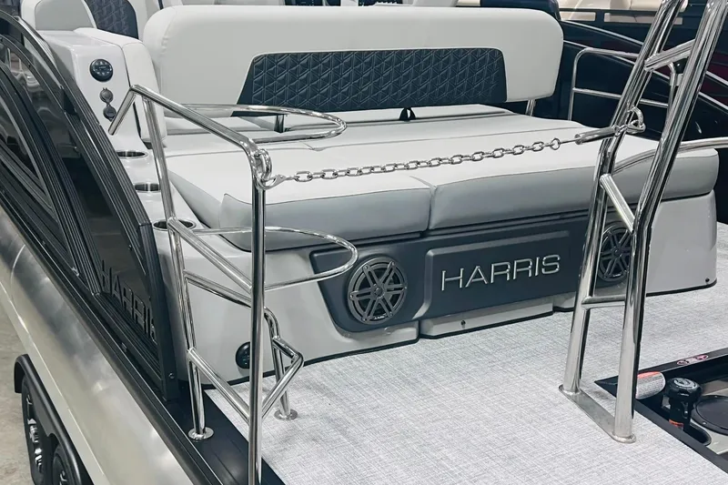 Slide: The Image of 2025 Harris Solstice 250 boat interior with plush seating and sleek metal railings. - 38