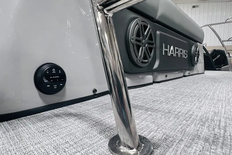 Slide: The Image of 2025 Harris Solstice 250 boat interior with JL Audio speakers and sleek design. - 39