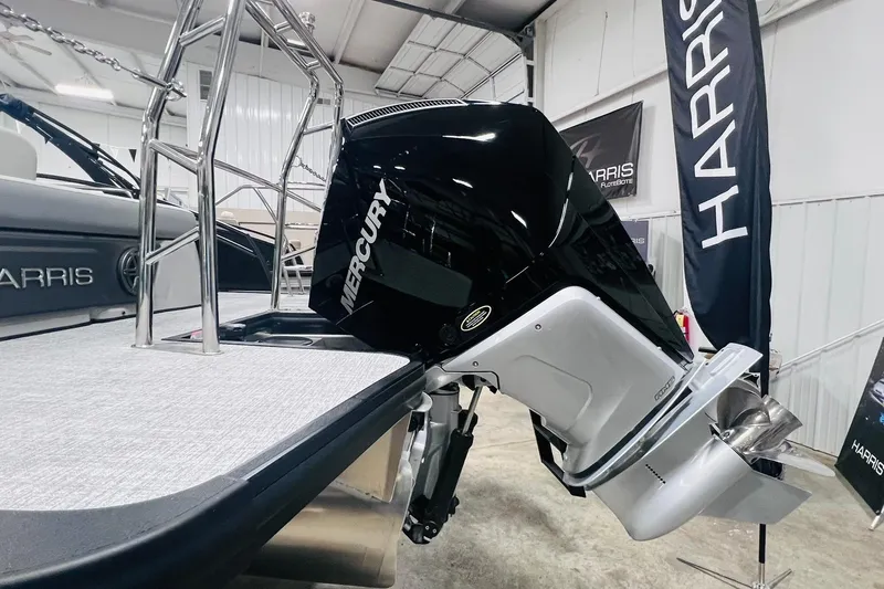 Slide: The Image of 2025 Harris Solstice 250 boat with Mercury outboard motor in showroom. - 40