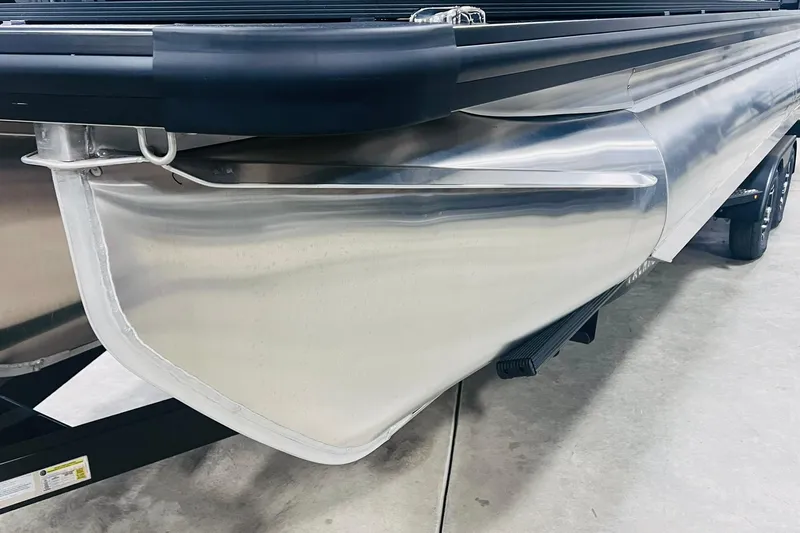 Slide: The Image of 2025 Harris Solstice 250 pontoon boat, sleek aluminum hull detail. - 55